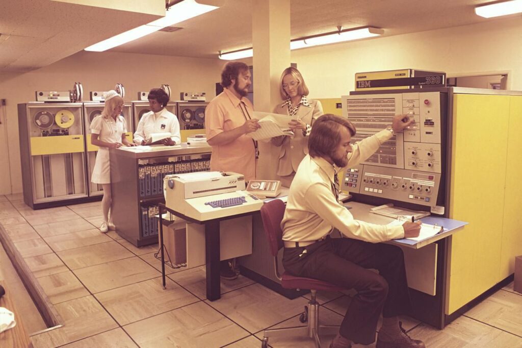 The image shows the IBM model 701 computer mainframes